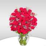 One Sided Round Arrangement Of Red Roses With Fillers Of Limonium In A Matka Vae